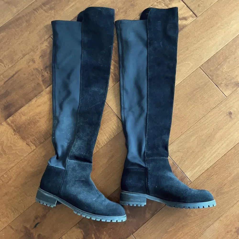 Black above the knee high boots